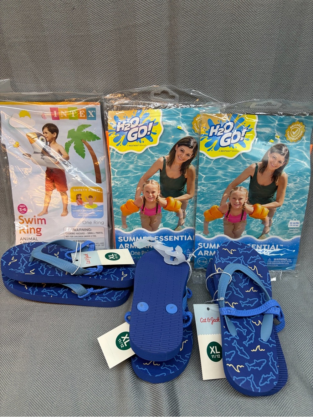 NWT bundle of six flip-flops /armbands and swimming ring summer toys beach